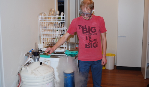 Alexander pouring liquid nitrogen into a dewar flask, 2017.